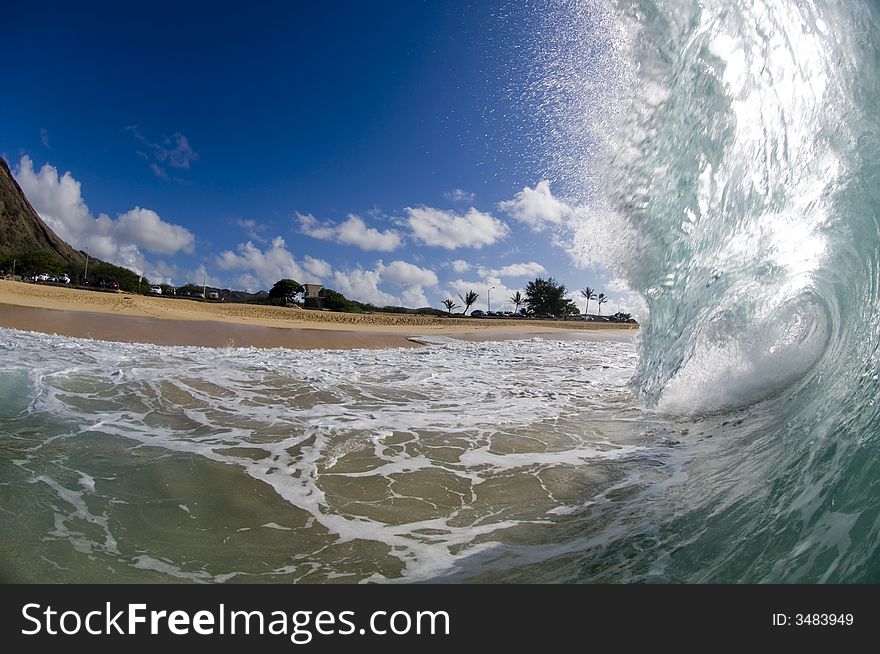 Giant wave breaking in shallow waters