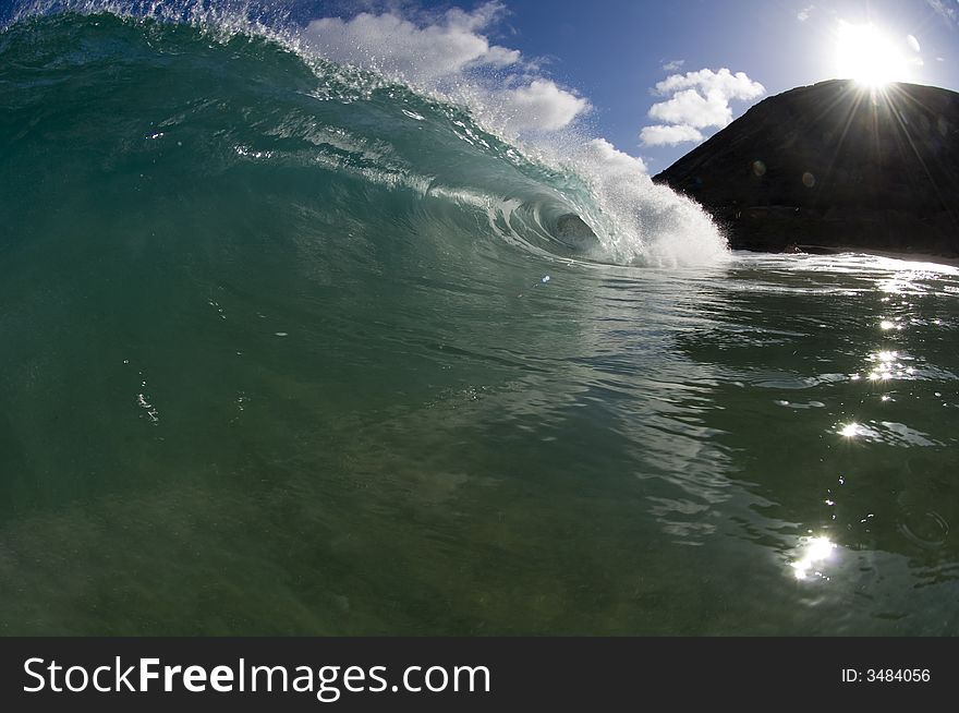 Giant wave breaking in shallow waters