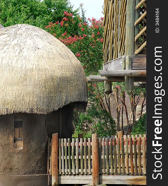 Native hut surrounded by modern decking. Native hut surrounded by modern decking