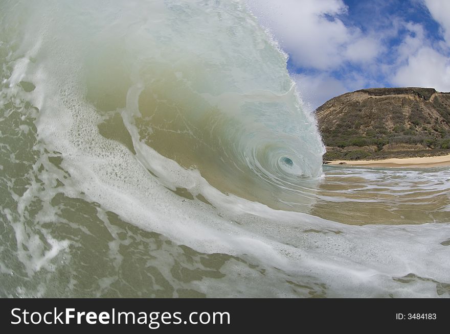 Giant wave breaking in shallow waters