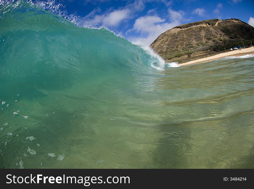 Giant wave breaking in shallow waters