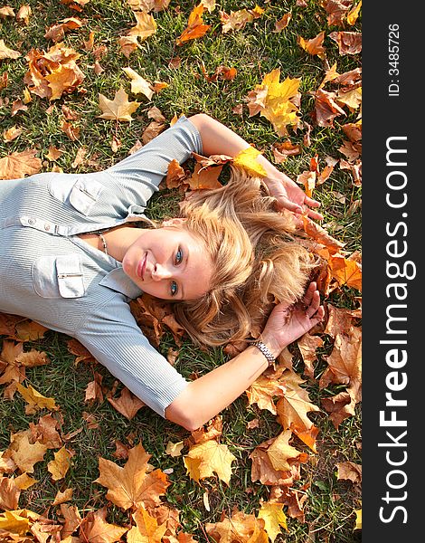 Blonde In Autumn Leaves