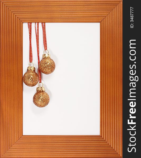 Red golden christmas decoration in frame on white background
