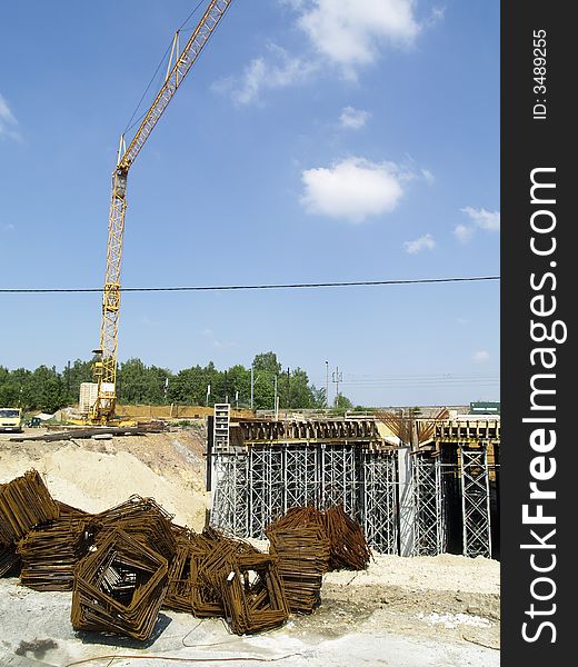 Construction site including steel structure and crane. Construction site including steel structure and crane