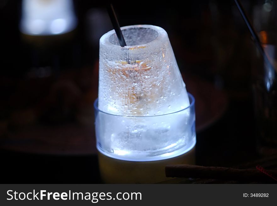 Ice shot-glass in the dark