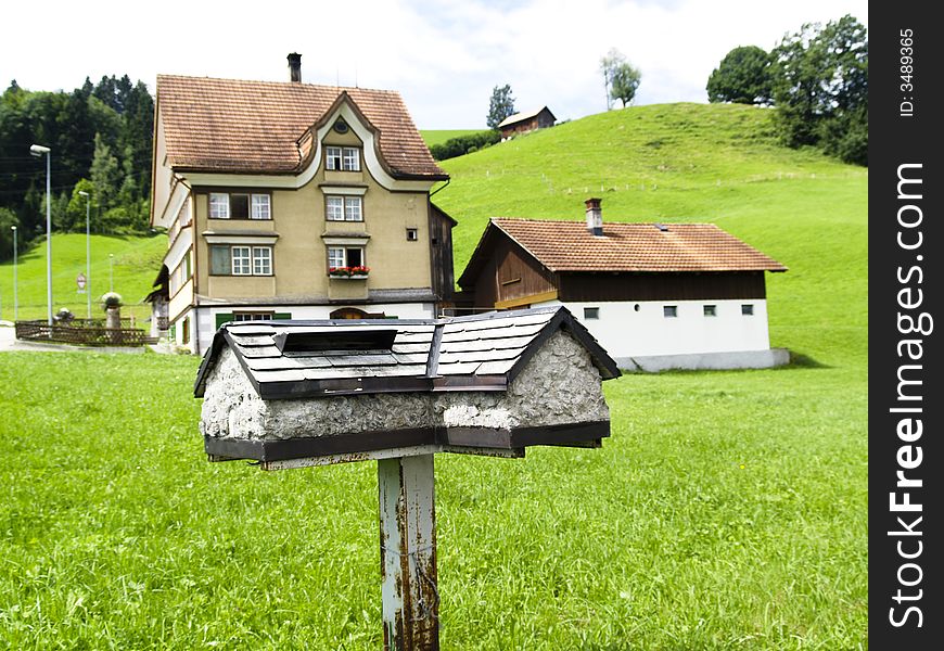 Beauty big mailbox in green garden - Alps
