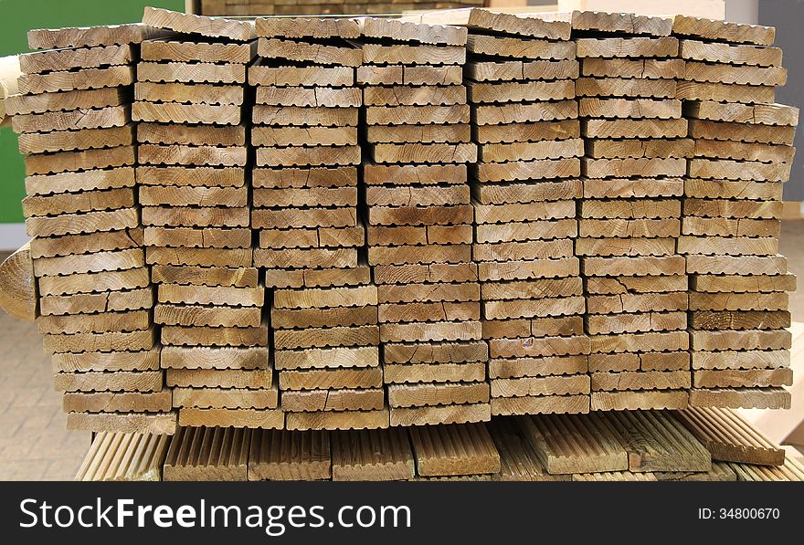 A Neat Stack of Machined Wooden Planks for Decking. A Neat Stack of Machined Wooden Planks for Decking.