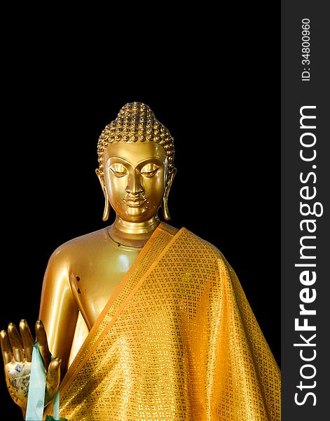 Buddha isolated with black background. Some part of buddha is pealed. The artist just want to keep it as real texture