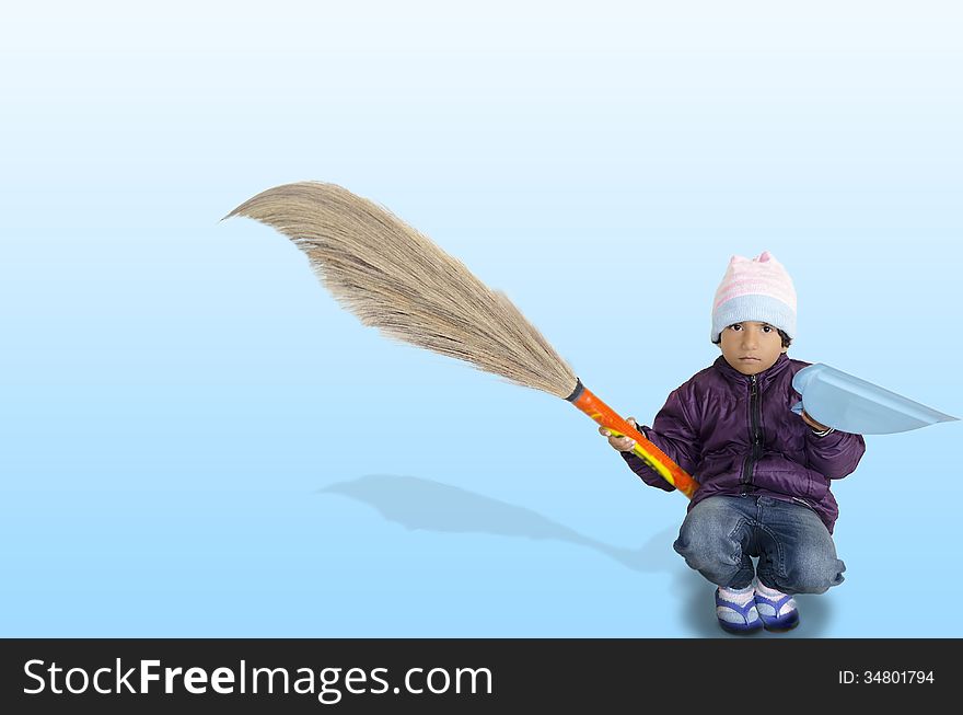 Little helper girl child with broom and dust collector in hands in purple jaket isolated on skyblue background. Little helper girl child with broom and dust collector in hands in purple jaket isolated on skyblue background