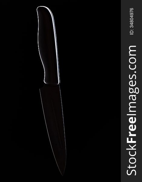 Kitchen Knife On A Black Background