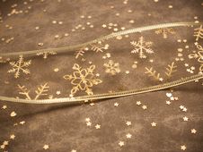 Golden Snowflake Ribbon On Golden Background Stock Images Golden Snowflake Ribbon On Golden Background Stock Images