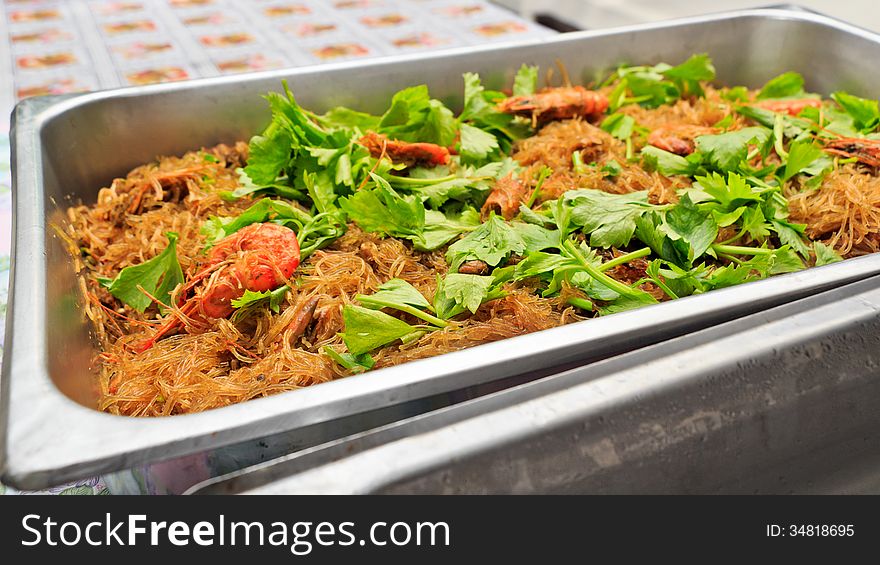 Casseroled or Bake prawns/shrimps with glass noodles is asia main food.