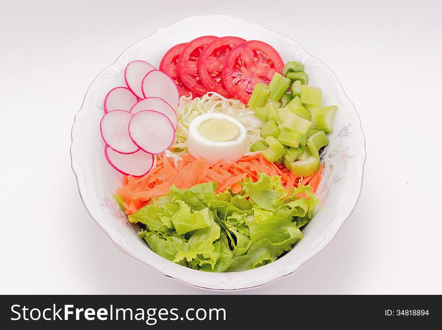 Vegetable salad for a healthy life served in ceramic bowls. Vegetable salad for a healthy life served in ceramic bowls