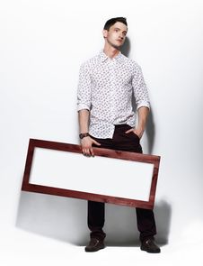 Fashion Man Holding Board With White Blank Space For Text Stock Image Fashion Man Holding Board With White Blank Space For Text Stock Image