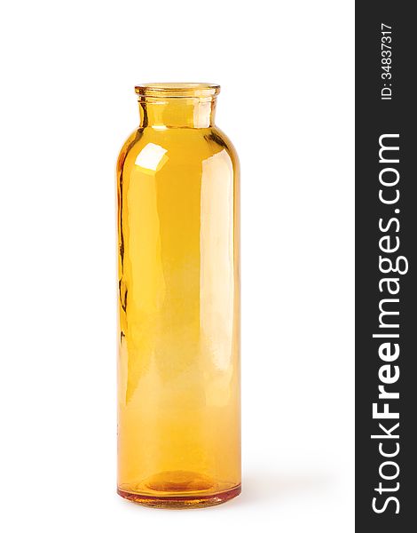 Yellow glass bottle on a white background