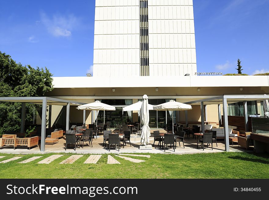 Hotel guests in the cafe patio. Hotel guests in the cafe patio