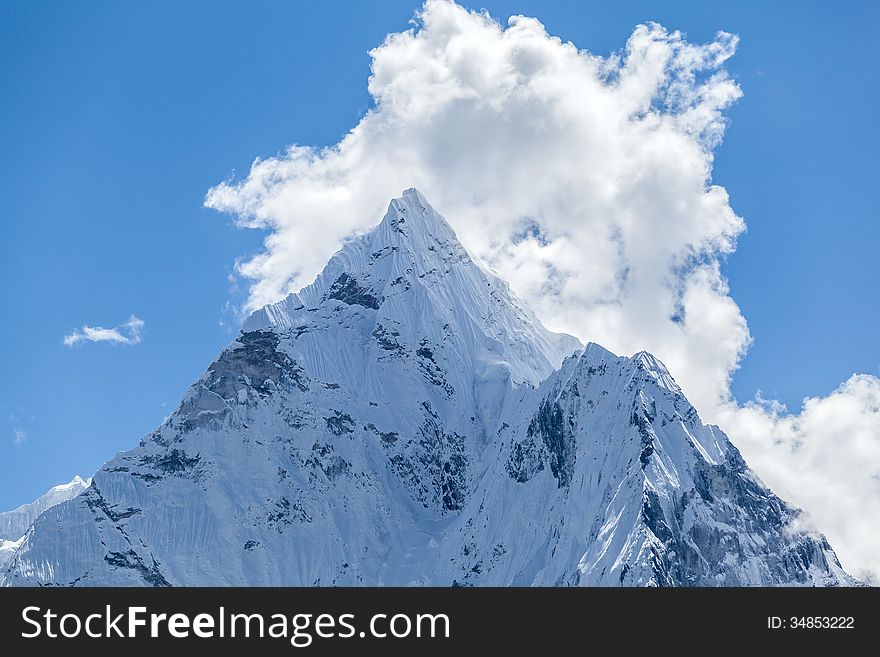 Mount Ama Dablam in Himalaya Mountains, Nepal. Beautiful Himalayan landscape on sunny autumn day. Mount Ama Dablam in Himalaya Mountains, Nepal. Beautiful Himalayan landscape on sunny autumn day.