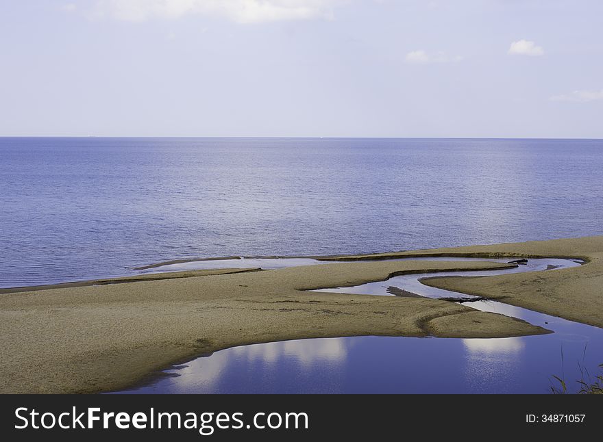 Sea and land creating a beautiful nature design. Sea and land creating a beautiful nature design