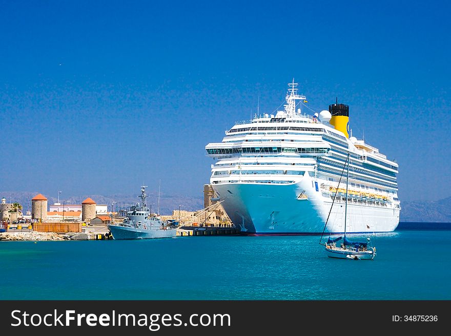 White cruise liner in the port of Rhodes Greece. White cruise liner in the port of Rhodes Greece