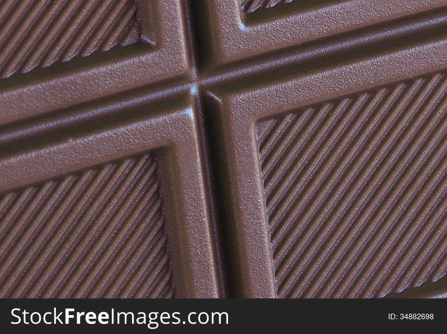 Chocolate background diagonal cloth, texture, macro. Chocolate background diagonal cloth, texture, macro