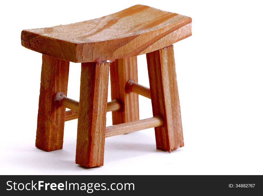 Wooden stool isolated on a white background