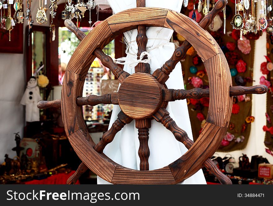 Fake wheel at the entrance to the gift shop