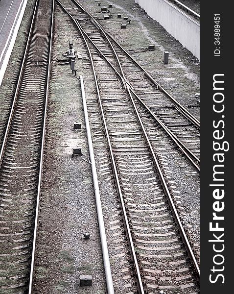 Railway texture background. Railroad - transport landscape with lines of rails. Perspective way on forward railway. Railway texture background. Railroad - transport landscape with lines of rails. Perspective way on forward railway.