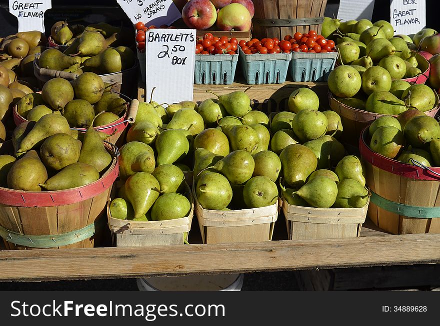 Fresh pears and a variety of produce for sale. Fresh pears and a variety of produce for sale