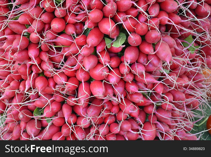 Radishes for sale at a local farm market in rural Michigan, USA