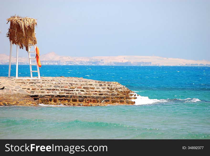 The beach on the Red Sea with blue water