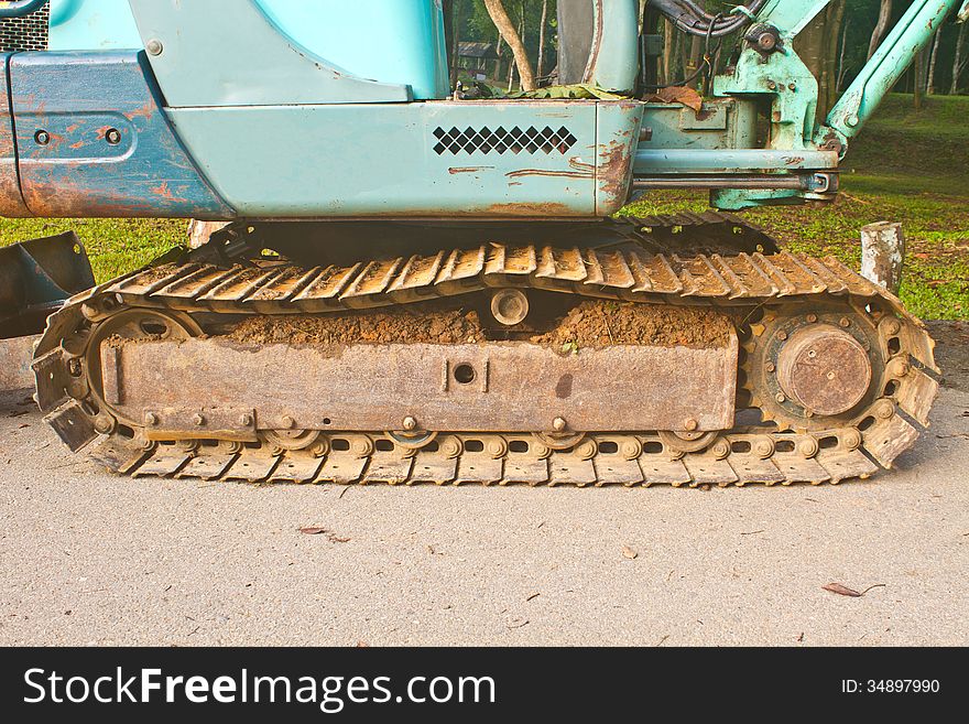 Excavator tracks, Backhoe wheel located on site for constuction