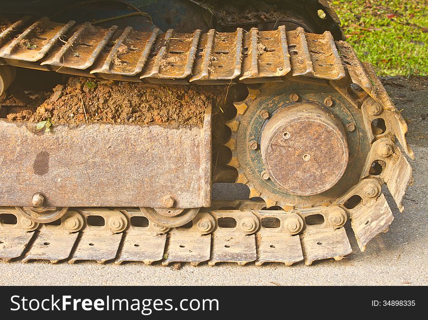 Excavator tracks, Backhoe wheel located on site for constuction