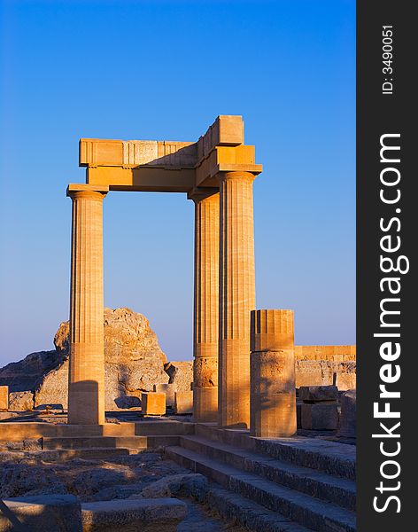 Temple of Athena at the top of Acropolis in ancient town Lindos, Rhodes island, Greece. Temple of Athena at the top of Acropolis in ancient town Lindos, Rhodes island, Greece