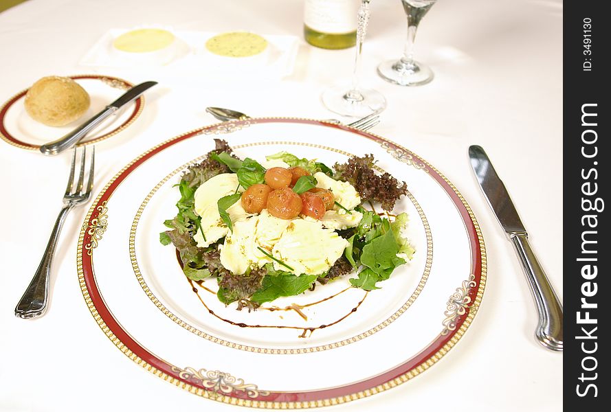 Salad with cheese and cherry tomatoes