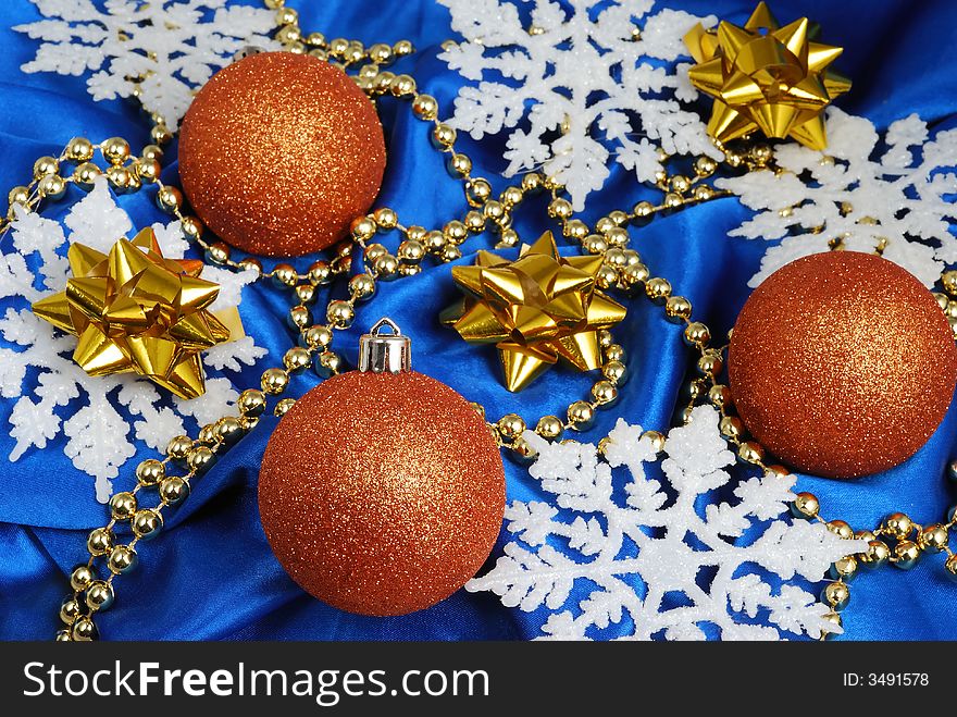 Christmas balls decorations on blue stuff. Christmas balls decorations on blue stuff
