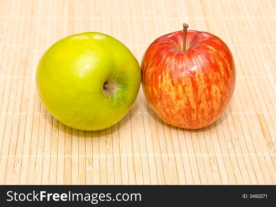 A green and a red apple. A green and a red apple