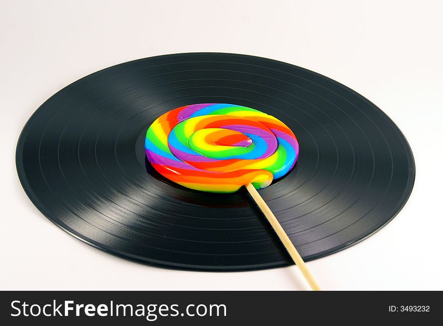 Photo of a vintage recording piece with candy. Photo of a vintage recording piece with candy