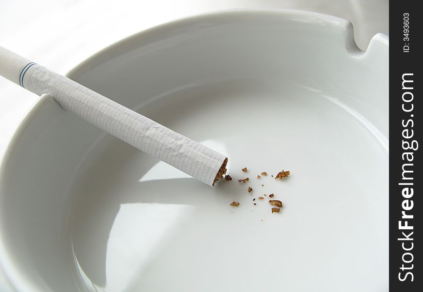 Cigarette and ashtray