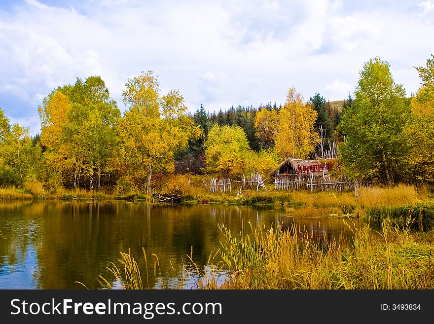 Autumn,Mongolia lake and house