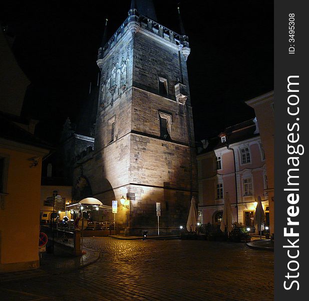 Prague tower at night alight