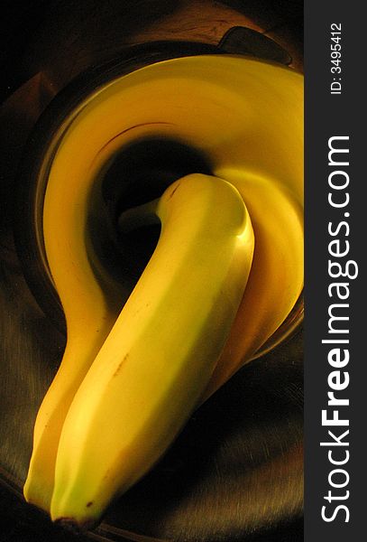 Banana in gold trumpet in room