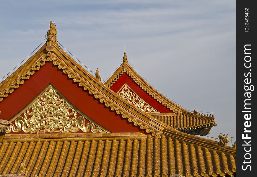 Edge of a chinese temple roof with little figures on it. Edge of a chinese temple roof with little figures on it