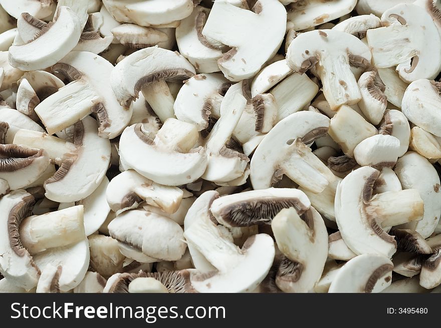 Closeup of many champignons, prepared for cooking. Closeup of many champignons, prepared for cooking