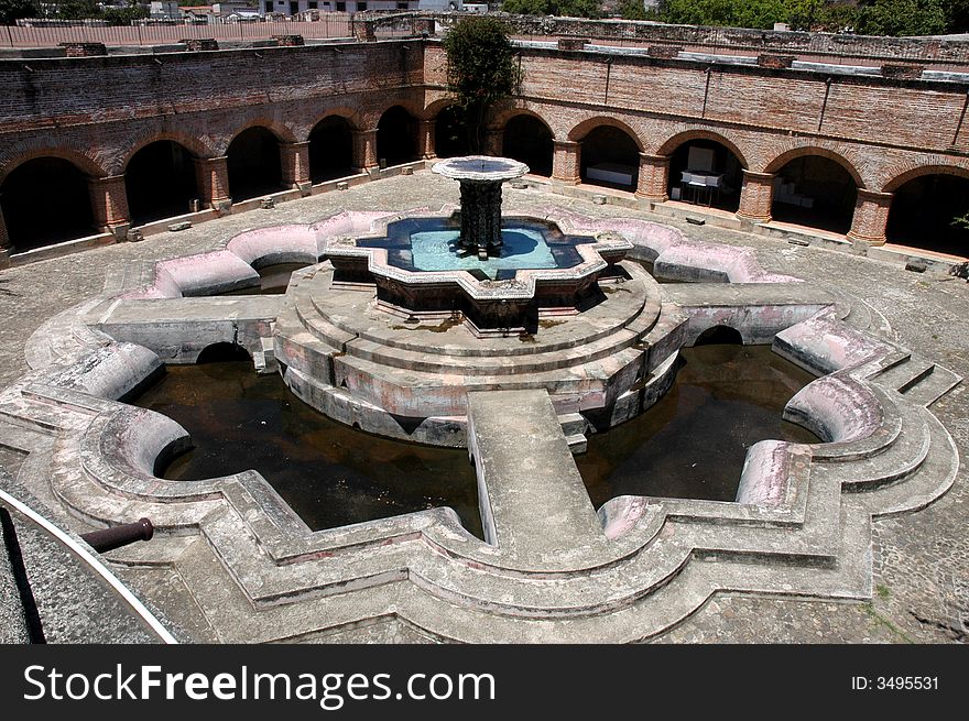 A fountain in a square in Antigua, Guatemala. A fountain in a square in Antigua, Guatemala