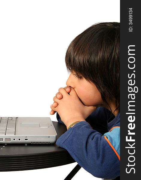 Digital photo of a little boy enjoying the laptop. Digital photo of a little boy enjoying the laptop.