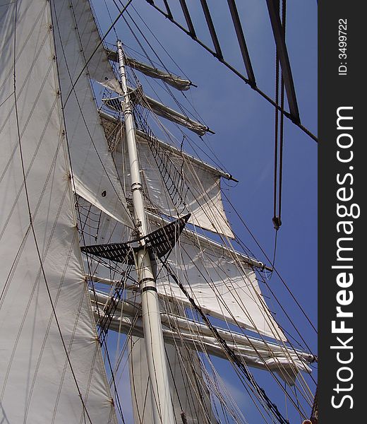 Detail of a mast and sail of a large sailboat.