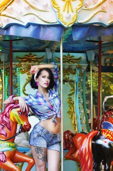 Merry-go-round. Playful Stylish Showy Woman In Roundabout. Funfair Stock Photography Merry-go-round. Playful Stylish Showy Woman In Roundabout. Funfair Stock Photography