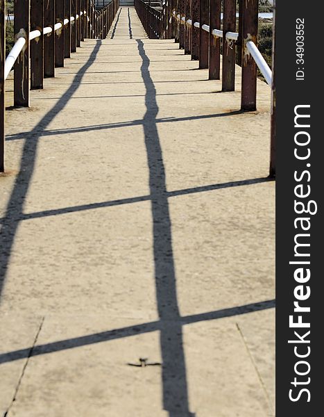 Detail of a small bridge in iron and cement. Detail of a small bridge in iron and cement.