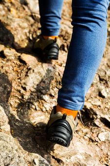 Hiking Shoes Closeup,walking On Mountain Road Royalty Free Stock Photography Hiking Shoes Closeup,walking On Mountain Road Royalty Free Stock Photography