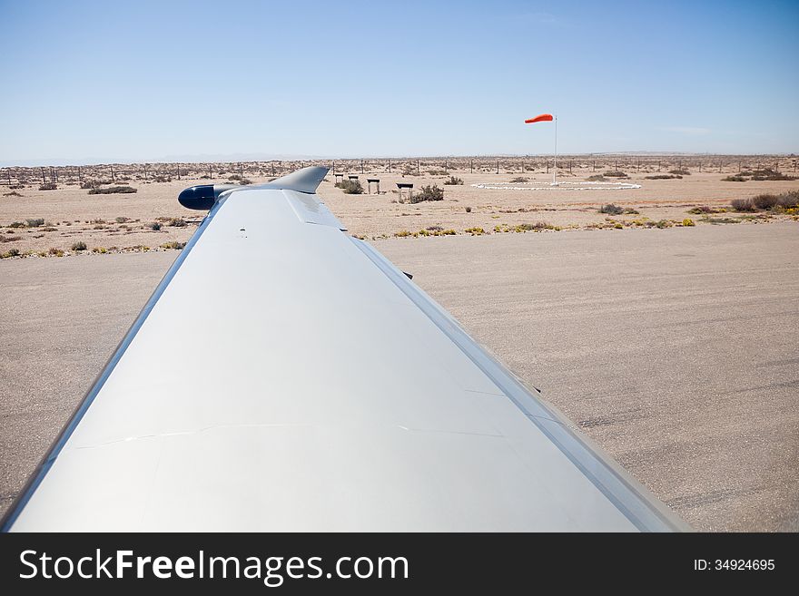 Desert view from aircraft on runway - landscape exterior